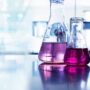 Purple,Glass,Flask,In,Blue,Research,Chemistry,Science,Banner,Laboratory burette laboratorio